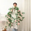 Decoración de pared de flor de rosa de vid artificial de plástico, popular fondo de planta falsa para bodas, decoración del hogar y escaparates, con vides florales entrelazadas