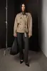 Popular gabardina corta transfronteriza europea y americana con botones de doble botonadura, cinturón para ceñir la cintura, cuello alto, charreteras, elegante chaqueta de trabajo para personas menudas