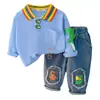 Comercio exterior ropa infantil ropa de bebé otoño lindo solapa manga larga traje bebé niño moda una generación de ropa para niños