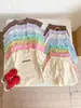 Conjunto de Verano para Niñas Estilo Coreano Camiseta de Manga Corta y Shorts Dos Piezas Color Sólido Estampado Casual Ropa Infantil Nueva Ropa de Verano para Niños