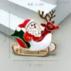 Broches de la Serie Navideña Más Vendida Transfronteriza Europea y Americana, Insignias Decorativas de Dibujos Animados de Papá Noel a la Moda y Lindas