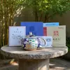 Título actual: Tesoro Nacional Horno Yigu Wanhua Una Olla Cuatro Tazas Cerámica Plateada en Plata Juego de Regalo en Caja de Regalo