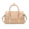 Bolsa bowling estilo coreano, minimalista e fashion, coleção de inverno 2025, bolsa de mão feminina, bolsa transversal requintada e estilosa