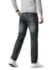 Jeans de Mezclilla Lavada Estampada Retro Gruesos Otoño Invierno 2026 para Hombre Pierna Recta Ajustada Elásticos Modernos Versátiles Pantalones Largos