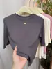 Nueva camiseta elegante de cuello alto medio y manga de cinco cuartos para mujer, colección de verano 2026, versátil y favorecedora, top de manga media a la moda