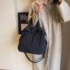 Venta al por mayor de fábrica nueva bolsa de mujer moda bolsa de mensajero de tela Oxford versátil casual multifuncional bolsa de hombro portátil para mujer
