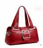 Bolsa Feminina de Couro Genuíno Estilo Europeu e Americano 2024 Bolsa de Mão Fashion e Mais Fácil de Combinar Bolsa Almofada Bolsa de Ombro para Mulheres de Meia-Idade