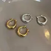 Fangtangjia Pendientes de Aro Redondos Lisos de Metal Brillante de Alta Calidad Diseño de Nicho de Gama Alta Pendientes Elegantes de Otoño e Invierno