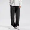 Pantalones de color liso de moda versátiles para hombre, pantalones casuales, pantalones deportivos, moda juvenil, holgados, moda INS, marca de moda