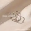 Anillo abierto irregular de acero inoxidable, bañado en oro y plata, estilo europeo y americano, diseño simple retorcido, anillo para mujer, venta al por mayor desde el fabricante