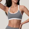 Top regata com gola halter para fitness e yoga transfronteiriço, sutiã esportivo sexy europeu e americano, top regata com blocos de cor para Pilates