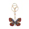 Llavero de Mariposa de Cristal Colorido Europeo y Americano Aleación de Metal Creativo Incrustado de Diamantes Colgante para Bolso de Mujer Anillo de Llavero Regalo