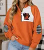 Jaqueta europeia e americana transfronteiriça feminina com blocos de cor e zíper parcial na gola alta, apresentando estampa digital 3D, corte solto estilo street style e propriedades corta-vento.