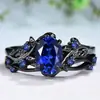 Anillo de Rubí Anillo de Cruz Rama de Rosa Negra Anillo Retro Europeo y Americano de Comercio Exterior Más Vendido Fabricante Mayorista