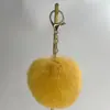 Venta Directa de Fábrica Colgante de Bola de Pelo de Conejo Sintético Accesorios para Mascotas Materiales para Juguetes Colgante para Bolso Llavero Bola Redonda