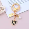 Llavero Estilo Tweed Lazo Colgante de Corazón Cadena de Perlas Llavero Colgante para Bolsos y Teléfonos Móviles Manualidades para Niñas