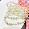 Nuevos y Creativos Adornos de Botella de Arena Movediza Infundidos con Aceite Líquido de Caracola Pequeña Llavero Acrílico Accesorios Colgantes para Bolsos Venta al por Mayor