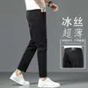 Jeans elásticos de ajuste slim de marca de alta gama en color negro para hombre, nuevo modelo otoño 2026, lavables y que no destiñen, jeans de pierna recta para hombre