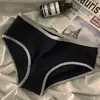 Estilo deportivo minimalista en simples bragas de algodón puro blanco y negro de cintura media para mujer al por mayor
