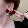 Clip de Oreja de Perla de Camelia Pendientes Rojos de Rosa de Año Nuevo Clavos Temperamento de Celebridad de Internet Francesa Pendientes Nuevos de Primavera y Verano