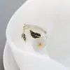 Anillo abierto de plata Nafoge al por mayor con pétalos de jade Hetian natural Anillo de plata vintage para mujer de plata de ley 925