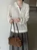 Suéter de punto de lana ultrafina estilo coreano con solapa y manga larga, tipo dos piezas falsas para mujer, modelo nuevo de otoño 26, holgado y versátil para ir al trabajo