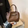 Bolsa Balde Retrô de Design de Nicho Coreano Transfronteiriça 2026 Nova Super Popular Mais Vendida Bolsa Pequena Transversal Texturizada