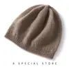 Cachemira 2026 Otoño/Invierno Nuevo Estilo Mujer Alta Gama Color Sólido Tejido Cálido Moda Hueco Encaje Gorro Plano