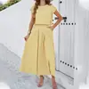 Nueva ropa de mujer de comercio exterior de otoño, conjunto de color liso europeo y americano para Amazon, elegante conjunto de dos piezas con dobladillo grande y mangas cortas