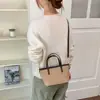 Bolso tote con acabado mate único, casual y versátil, nuevo bolso cubo 2026, bolso cruzado de gamuza retro y moderno