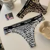 Gato Salvaje Orgulloso * Ropa interior sexy de leopardo europeo y americano, transpirable, de cintura baja, sin costuras, para mujer, seda de hielo, hueca, simple, tipo T