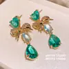 Aretes de Gema Azul Océano Endurecida al Hielo Forma de Gota de Agua Lazo Corazón Estilo Dulce Aretes de Circonita Lujo Ligero Aretes de Alta Gama para Mujer
