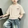 Camiseta de manga corta para niño, algodón puro, para niños mayores, de manga media para verano, nuevo corte holgado, top deportivo para niño, moderno