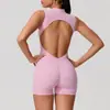 Traje de yoga de una pieza sin mangas con espalda hueca, estilo europeo y americano, para deportes y fitness, con almohadillas extraíbles en el pecho y diseño de nalga de melocotón para mujer