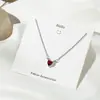 Collar de amor sencillo de estilo japonés y coreano, cadena de clavícula con astas cruzadas, flor, perla y colgante de latido de corazón de celebridad cibernética.