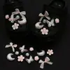 Novos chaveiros de resina para tamancos no atacado: designs fofos de desenhos animados, flores versáteis para sapatos em formato de borboleta, flores bolha e decorações de animais