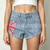 Chica picante Estampado Union Jack Borde deshilachado Estilo europeo y americano Primavera/Verano Nuevo 2026 Pantalones cortos de mezclilla de cintura alta para mujer Pantalones cortos de mezclilla