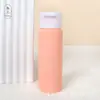 Botella de Viaje Macaron Manguera Exprimidora de 50 ml Traje de Embotellado Botella de Almacenamiento para Cosméticos Loción Champú Gamuza