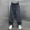 Pantalones Casuales Nuevos de Estilo Scimitar para Hombre Primavera y Otoño 2025 Estilo Coreano de Moda Sueltos Pierna Recta Parches Marca de Moda Pantalones Deportivos para Hombre