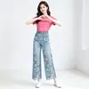 Calças de cintura alta e perna larga para mulheres, moda Primavera/Verão 2026, elegantes, versáteis, com recortes, com renda aplicada, jeans, calças com caimento