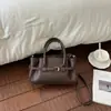 Bolsa de Mão Feminina Padrão Lichia Retrô Outono e Inverno 2026 Nova Moda Nicho Bolsa Tote de Mão Versátil Bolsa Transversal