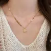 Colar de Pérola com Pingente de Disco Estrela Microcravejado Estilo Luxo Leve para Mulheres 2026 Novo Estilo Corrente de Clavícula com Toque de Alto Padrão