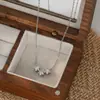 Corrente Elegante para Clavícula Banhada a Ouro Real com Zircônias Micro-Pavimentadas Design de Nicho Feminino Colar de Estrela de Cinco Pontas Colar de Estrela Exquisito