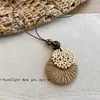 Nuevo collar colgante retro de ratán estilo chino para mujer, estilo bohemio, cadena de suéter de nicho de verano, accesorio de moda y versátil