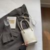 Bolso Cubo de Mano de Alta Gama Estilo Coreano Modelo Nuevo 2026 Bolso Cruzado de Hombro Simple Bolso Pequeño Casual Retro