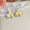 Aretes de botón de flor de gota de aceite con aguja plateada y circón aretes pequeños frescos de dopamina accesorios de aretes de sensación de lujo ligero de alta gama diseño de sentido nicho