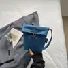 Bolso Cubo de Mezclilla Sencillo y Elegante de Color Sólido 2026 Nuevo Mini Bolso para Teléfono Cruzado Casual Ligero de Moda