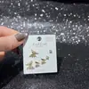 Nuevo Conjunto de Aretes de Múltiples Piezas, Aretes de Mariposa, Circonita Súper Brillante, Galvanizado Ecológico, Aguja de Plata S925, Moda de Invierno