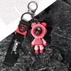 Llavero Creativo de Muñeco Astronauta de Goma Suave Colgante para Bolso Llavero de Coche Decoración Oso Rayo