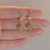 Pendientes de estilo chino retro transfronterizo europeo y americano, nuevos, de temperamento femenino, ligeros, de lujo, con perla de jade Hetian, con clip para la oreja con espiral antimosquitos